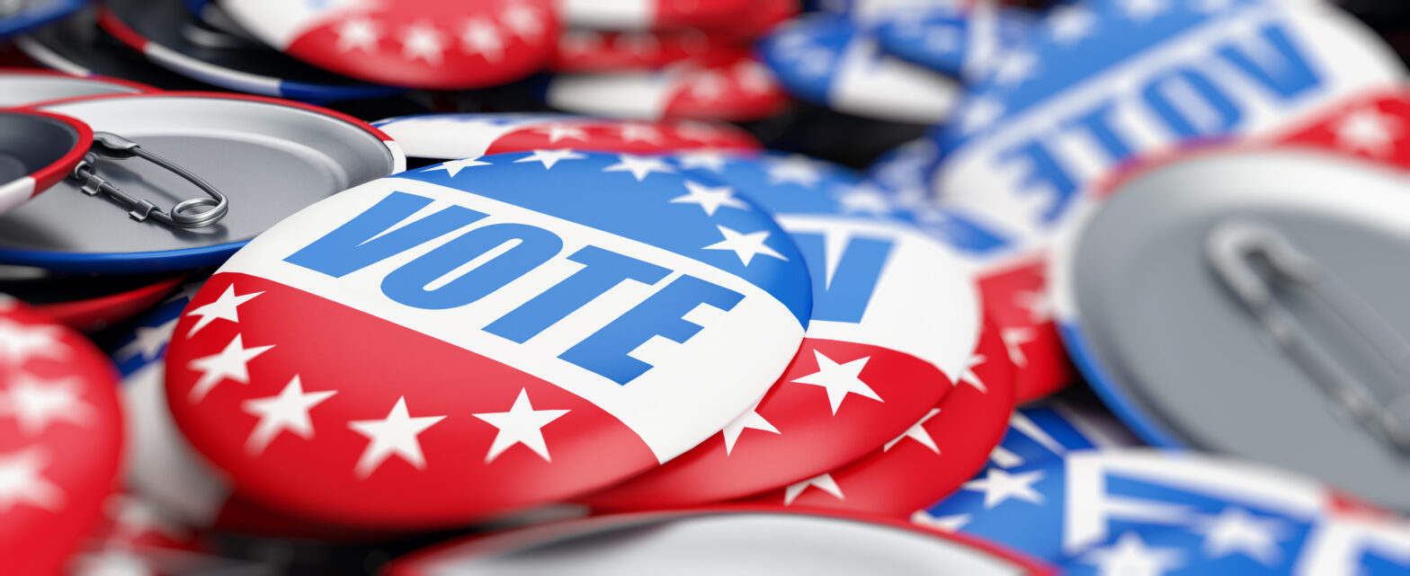 Red, white, and blue pins with the word "vote." Image directs to the Civic Engagement Webpage